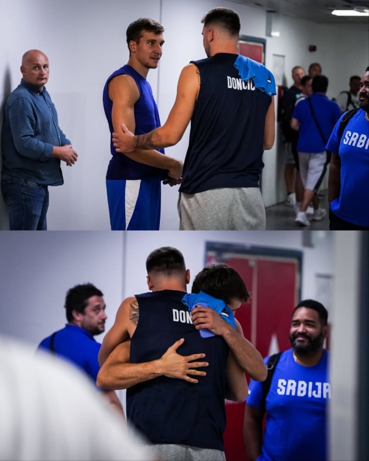 pg电子模拟器-焦点大战！东契奇与博格丹热身赛前拥抱致意互相交流